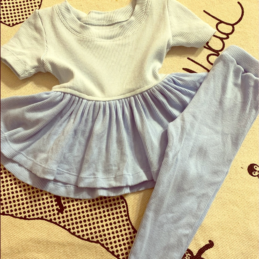 Omi Jo. Peplum top and knit leggings.